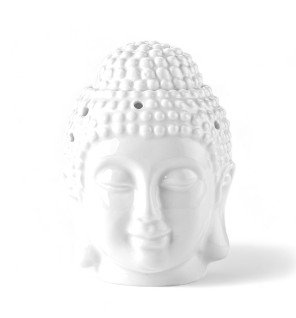  brûle-parfum bouddha blanc apportant une touche zen à une chambre paisible