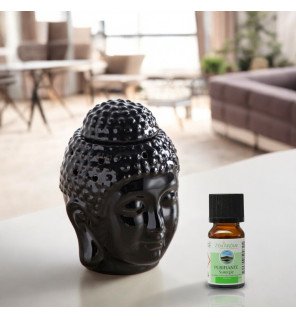  brûle-parfum dhyana noir utilisé dans un salon pour une atmosphère relaxante