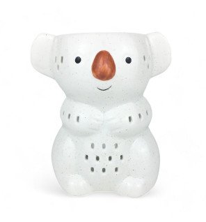  vue du brûle-parfum koko en céramique grise sous une lumière tamisée