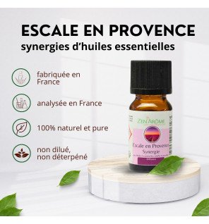 flacon de synergie d'huiles essentielles escale en provence 10 ml de la marque zen'arôme posé sur une table en bois