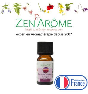  flacon d'huile essentielle escale en provence posé près d'une serviette et d'une bougie pour une ambiance spa