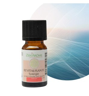  synergie d'huiles essentielles posée près de plantes vertes pour souligner l'aspect naturel et bien-être