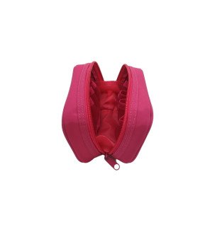  trousse compacte rose pour huiles essentielles glissée dans un sac à main pour un transport facile