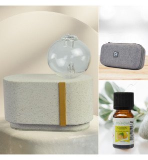  diffuseur par nébulisation cimio accompagné de flacons d’huiles essentielles pour illustrer la pureté de diffusion