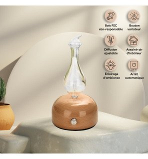  diffuseur posé près de livres et d’une tasse pour une ambiance détente et lecture