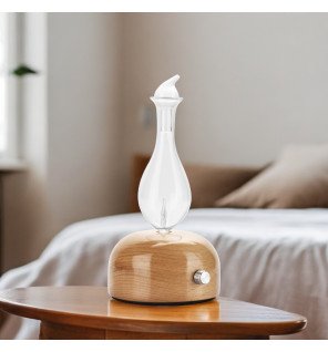  vue latérale du diffuseur mettant en avant la transparence du verre et la qualité des matériaux