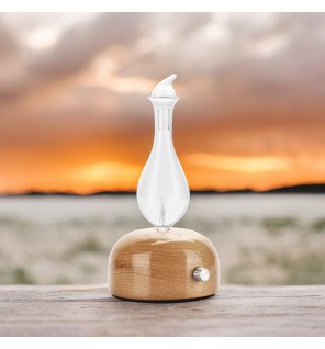  diffuseur aurora placé sur un bureau pour favoriser la concentration et la relaxation au travail