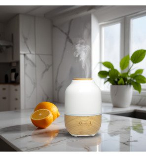  détail du bouton de commande du diffuseur purisia et de la finition bois élégante