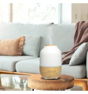  vue du diffuseur purisia dans une chambre à coucher pour une ambiance apaisante avant le sommeil