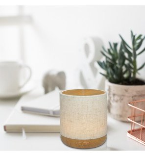  gros plan sur le diffuseur ultrasonique alesia mettant en valeur sa texture naturelle et son design épuré