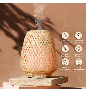  diffuseur d'huiles essentielles olaki en fonctionnement avec une fine brume s'échappant dans un intérieur moderne