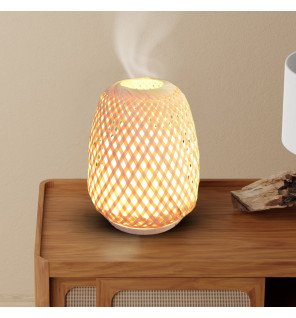  olaki diffuseur posé sur un bureau pour créer un espace de travail apaisant