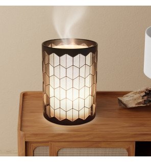  diffuseur d’huiles essentielles verone diffusant une brume apaisante dans une chambre zen