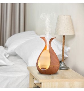  mise en situation du diffuseur medusa à côté de flacons d’huiles essentielles