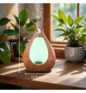  diffuseur medusa sur une table de chevet diffusant une lumière d’ambiance douce