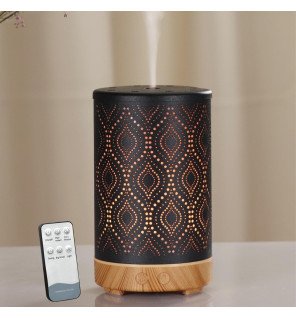  détail sur le bouton d’allumage du diffuseur séville et l’aspect métallique élégant