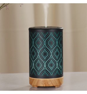  diffuseur séville sur une étagère entouré de plantes pour une décoration naturelle