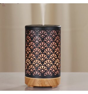  ambiance zen dans une chambre grâce au diffuseur sofia et à sa lumière led modulable