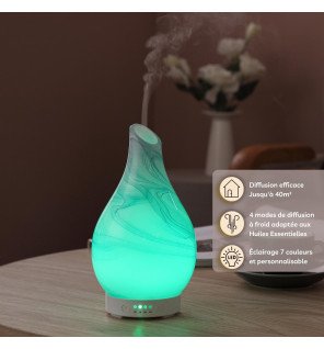  diffuseur ultrasonique en fonctionnement avec une légère brume s’échappant dans une chambre apaisante