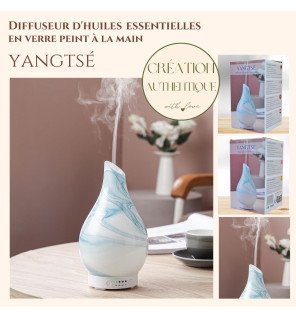  diffuseur d’huiles essentielles en fonctionnement dans une salle de bain pour une ambiance spa