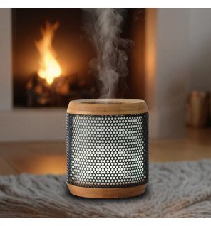  diffuseur d'huiles essentielles elipsia sur une étagère avec des flacons d'huiles à côté