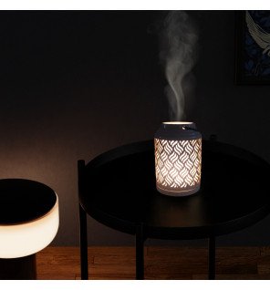  diffuseur venise utilisé dans une chambre pour créer une atmosphère apaisante avant le coucher