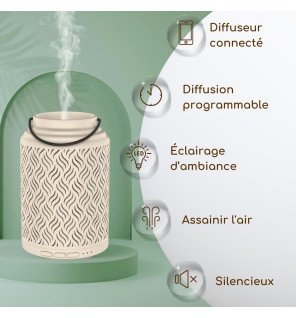  diffuseur venise en céramique blanche sur une table de chevet