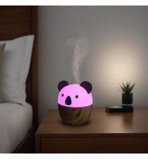  diffuseur woofie en fonctionnement avec une brume légère s'échappant dans une chambre apaisante