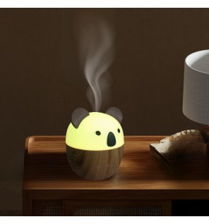  diffuseur ultrasonique compact placé sur un bureau pour une ambiance de travail relaxante