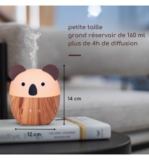  mise en scène du diffuseur woofie avec des huiles essentielles et des accessoires de bien-être