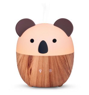  diffuseur ultrasonique usb intégré dans une décoration minimaliste pour un espace épuré et serein