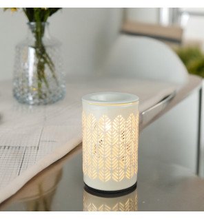  diffuseur en fonctionnement diffusant une lumière féérique dans une pièce tamisée