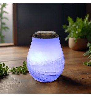  brûleur électrique en fonctionnement avec vapeur d’huile essentielle visible