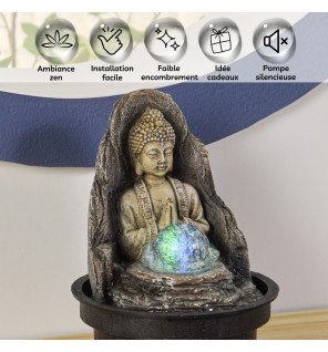  fontaine bouddha peace vue de côté mettant en valeur la chute d'eau