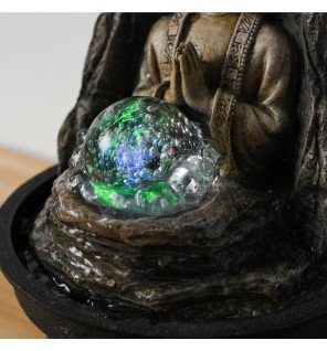  éclairage led bleu créant une atmosphère relaxante autour de la fontaine