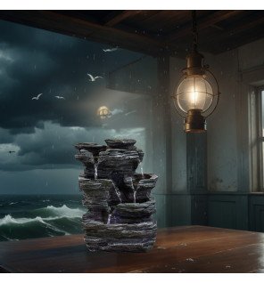  vue rapprochée du détail de l'écoulement d'eau naturel sur la fontaine pietra