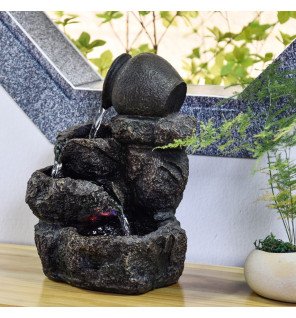  gros plan sur la finition naturelle et les reliefs de la fontaine zen'light