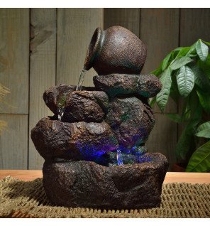  ambiance tamisée créée par la fontaine nivello nature en soirée