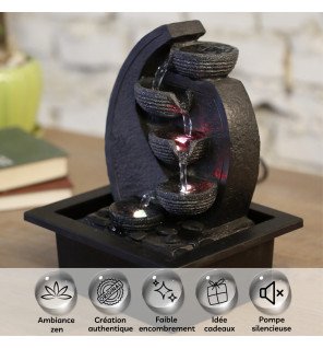  fontaine d'intérieur en fonctionnement dans un salon moderne