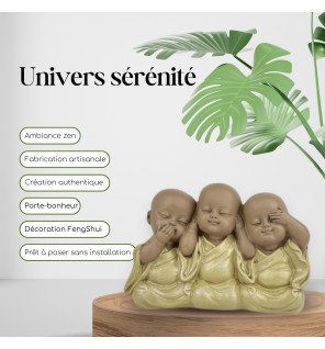  ambiance zen avec la statue bonzes embleme placée près de plantes vertes