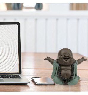  mise en scène de la statue avec des bougies pour renforcer l’atmosphère zen