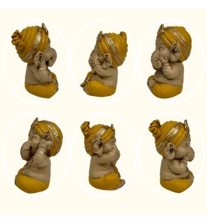  trio de statues ganesh jaune dans un coin méditation pour favoriser la détente