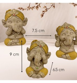  statues ganesh jaune associées à des bougies pour une atmosphère chaleureuse