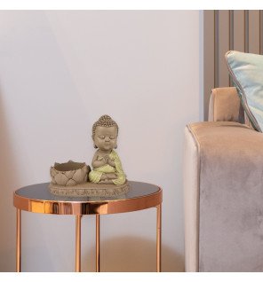  bougeoir bouddha utilisé lors d’une séance de méditation pour favoriser la détente