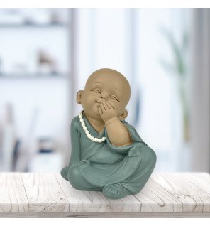  statue décorative en résine effet bronze représentant le silence dans un salon zen