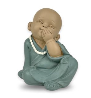  statue bonze silence entourée de bougies pour une ambiance chaleureuse et paisible