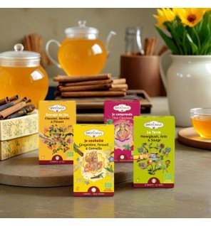 boîte de 4 infusions bien-être bio sans caféine sun&sia posée sur une table en bois