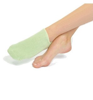  chaussettes spa vertes spa soigneusement rangées dans leur emballage pour illustrer la praticité du produit