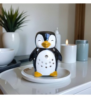  détail du brûle-parfum pingouin montrant la finesse de la céramique blanche