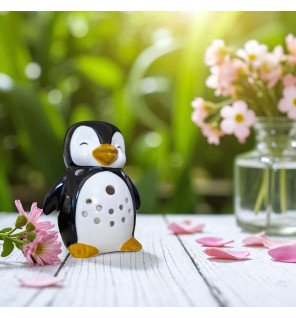  brûle-parfum en céramique pingouin diffusant une vapeur parfumée